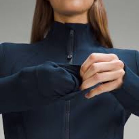 Lululemon Athletica navy
Luon Define
Size 12
Zipup jacket
Thumb holes 
Pockets - Picture 10 of 14
